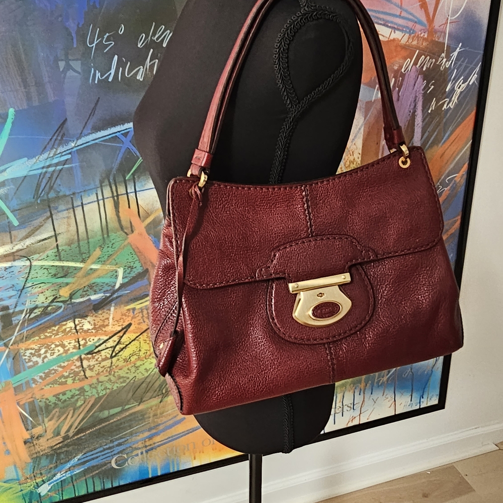 Tod's Red Shoulder Bag with Gold Clasp and Textured Leather